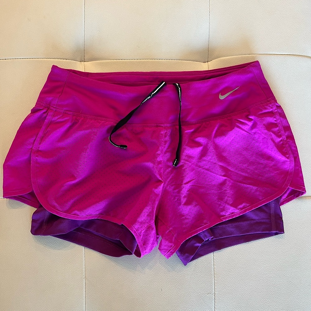 Pink/purple Nike running shorts Dri-Fit size Small. Like new. Worn maybe twice.
